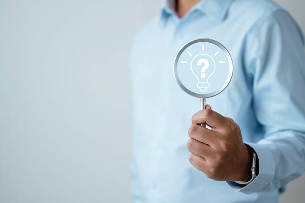 Searching idea magnifying concept. Magnifying glass research. Light bulb magnifier ideas. Creative rocket launch search. Innovation growth investment. question mark icon exam holding searching.